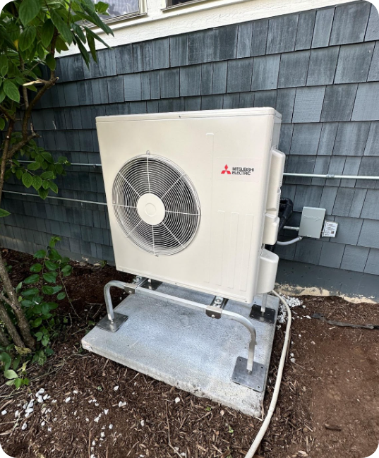 The Ductless Condenser Is Nicely Tucked Against The House